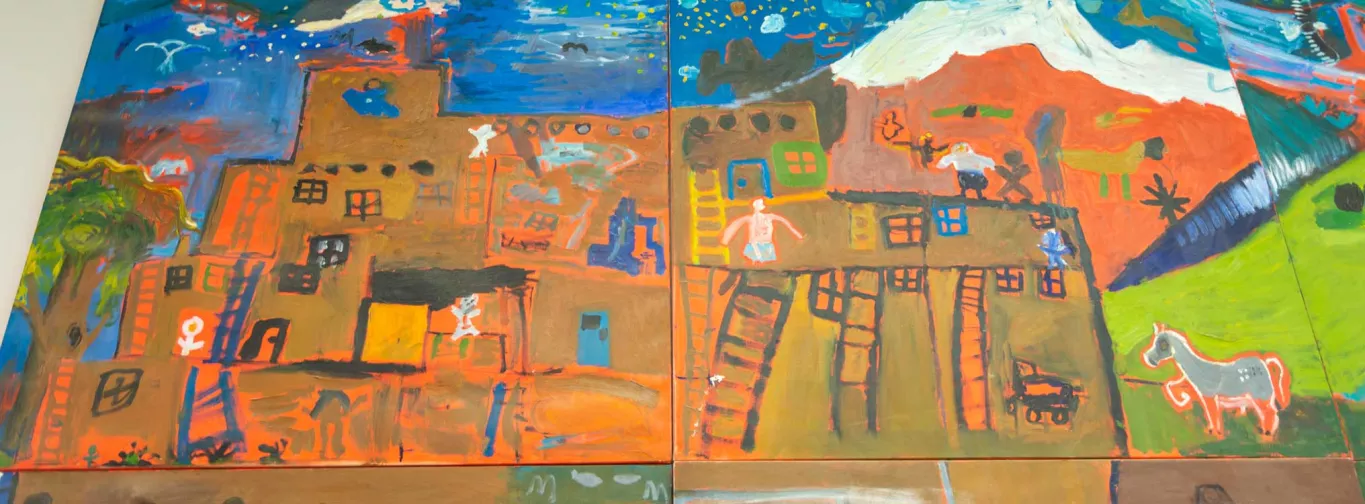 Taos Day School Student Painting of a Pueblo.