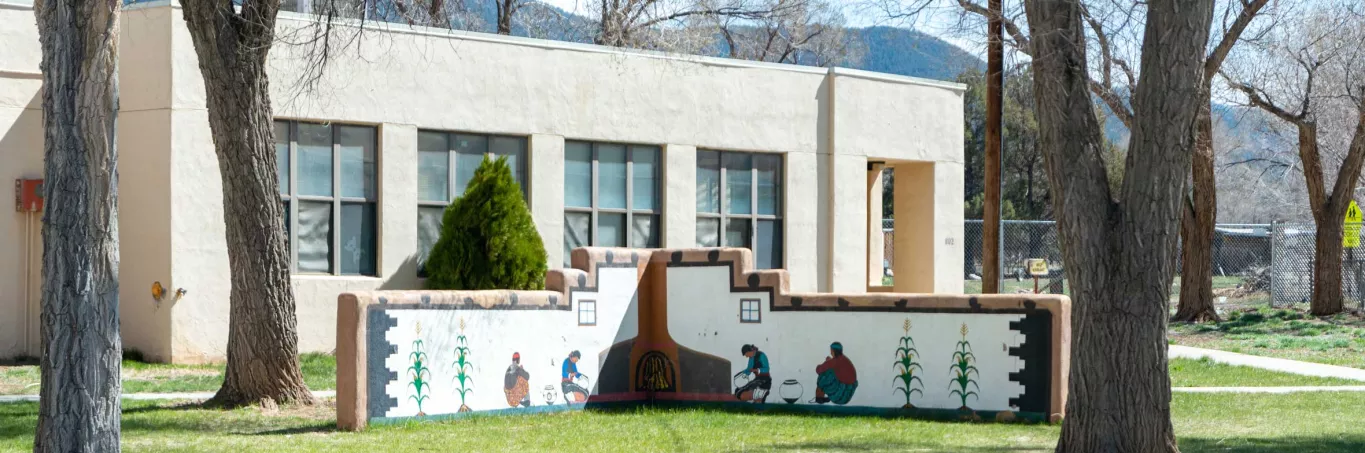 Exterior Photo of Taos Day School and Outdoor Mural.