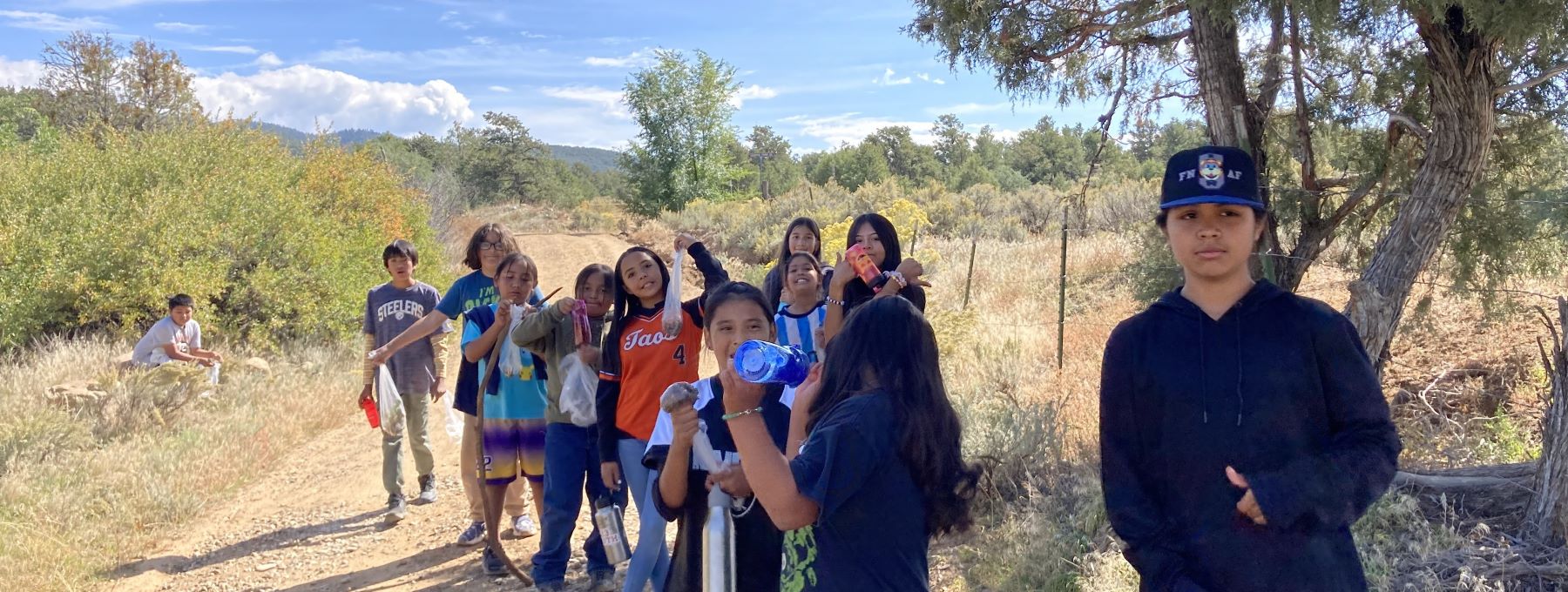 Fifth and sixth grade students on a walk outside.