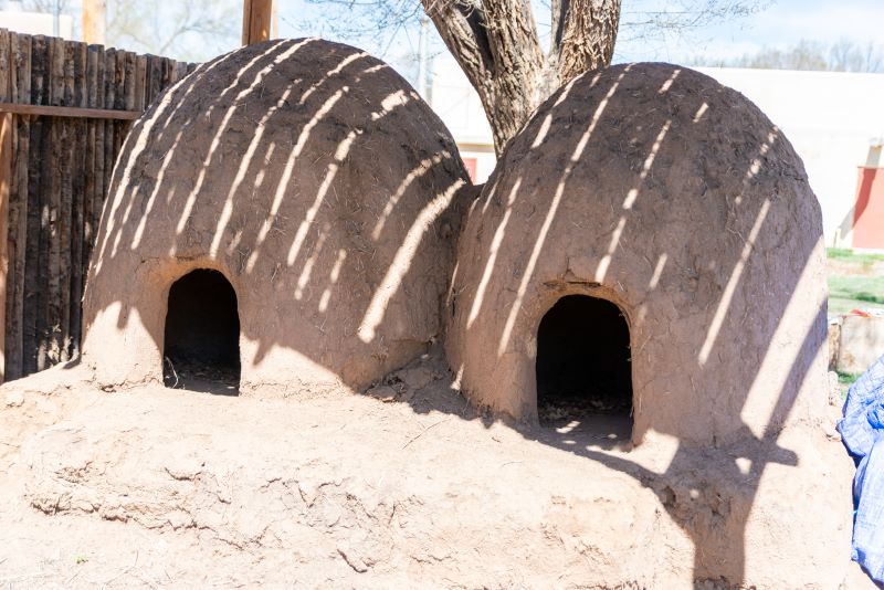 Two hornos outside Taos Day School