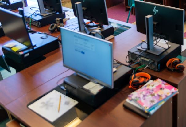 Taos Day School Computers on Desks in the Computer Lab.